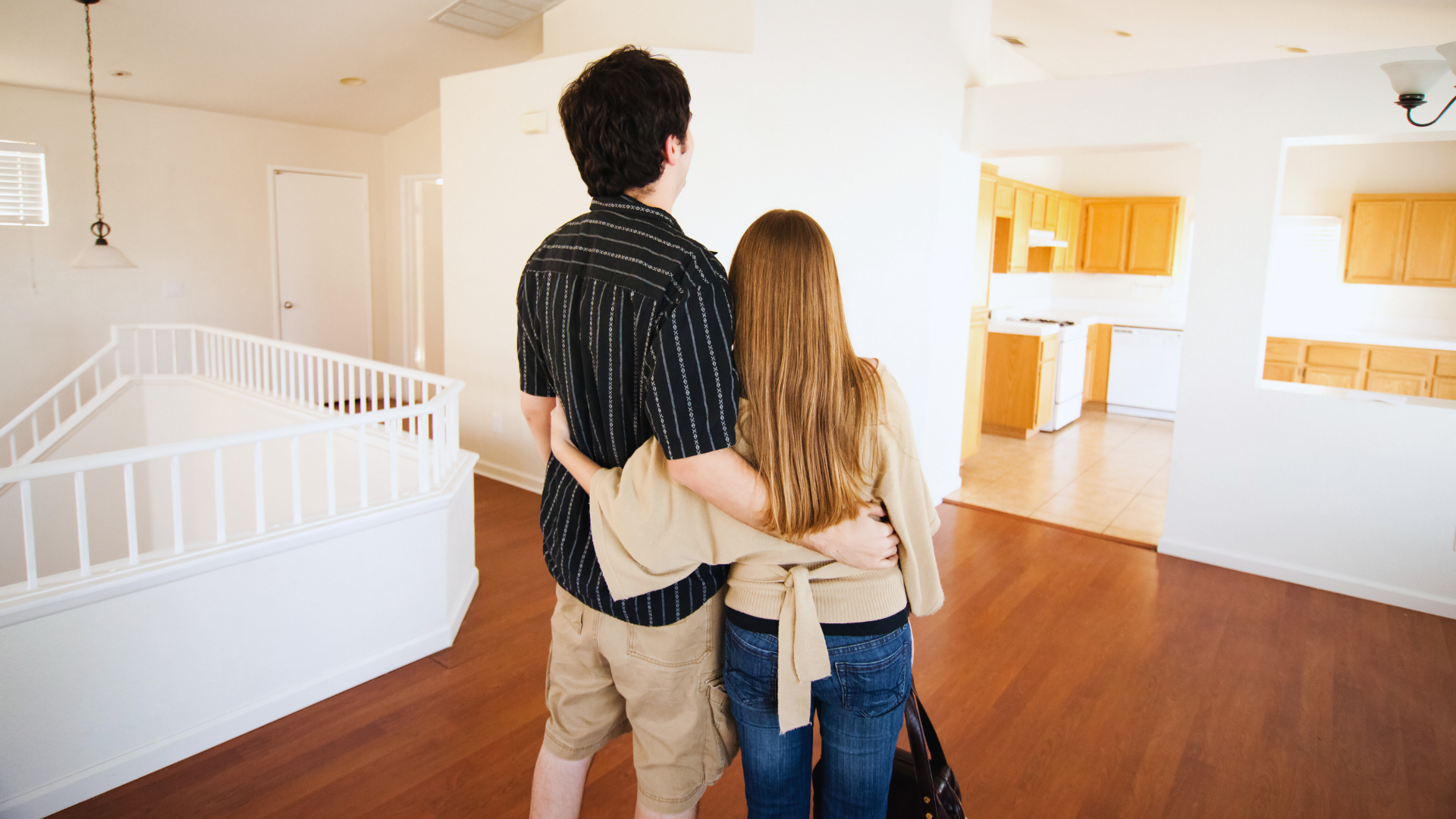 a couple buying a home